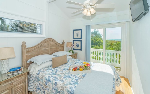 Queen Bedroom with TV and Beach Views